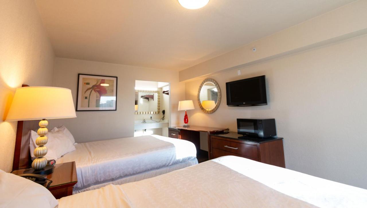 Magnuson Extended Stay And Suites Airport Hotel Irving Exterior photo